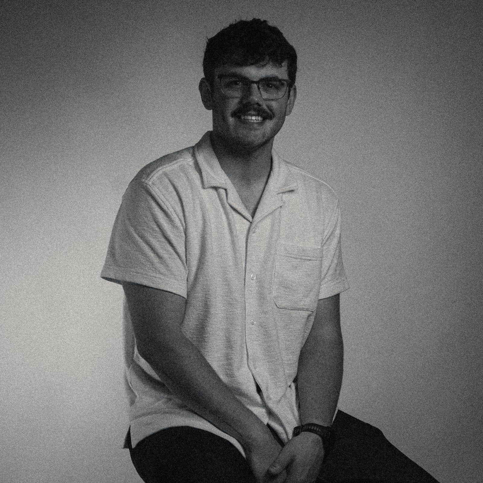 Nathaniel Bingham, a black and white portrait on film-style grain